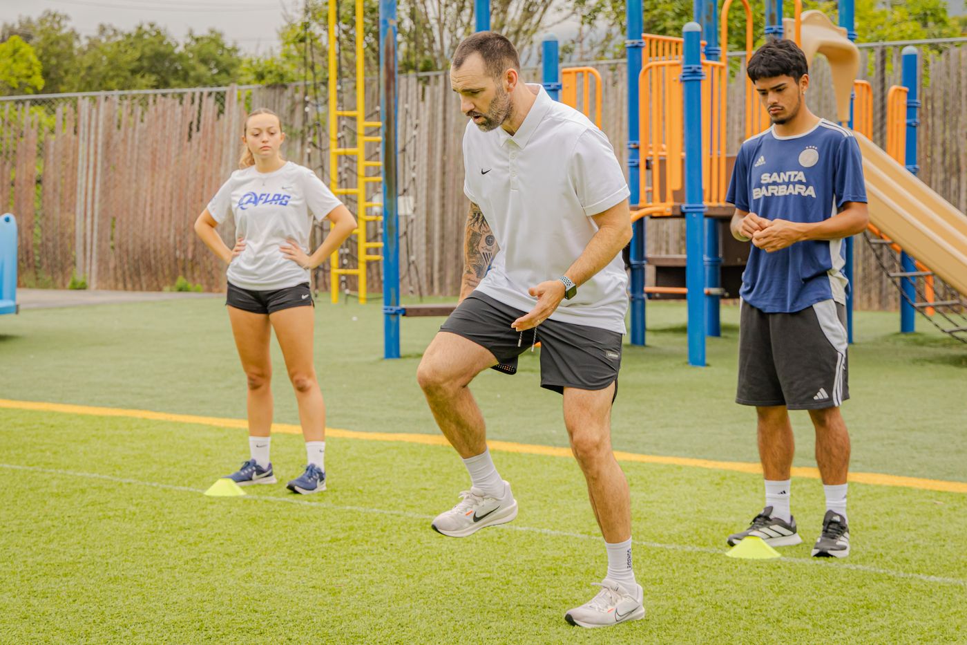 Coach Tovi demonstrating a single-leg balance drill